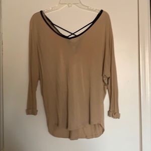 Tan colored 3/4 length sleeve.